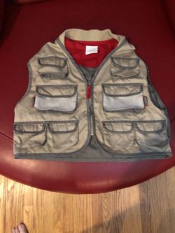 Child’s explorer vest, lots of pockets to carry their toys