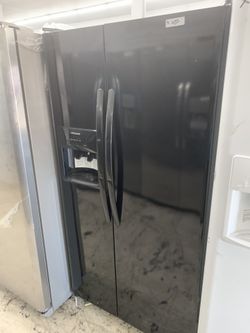 Frigidaire side by side in glossy black