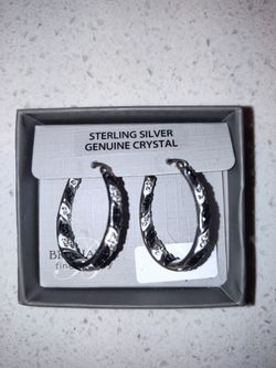 Sterling Silver And Topaz/Ruby?