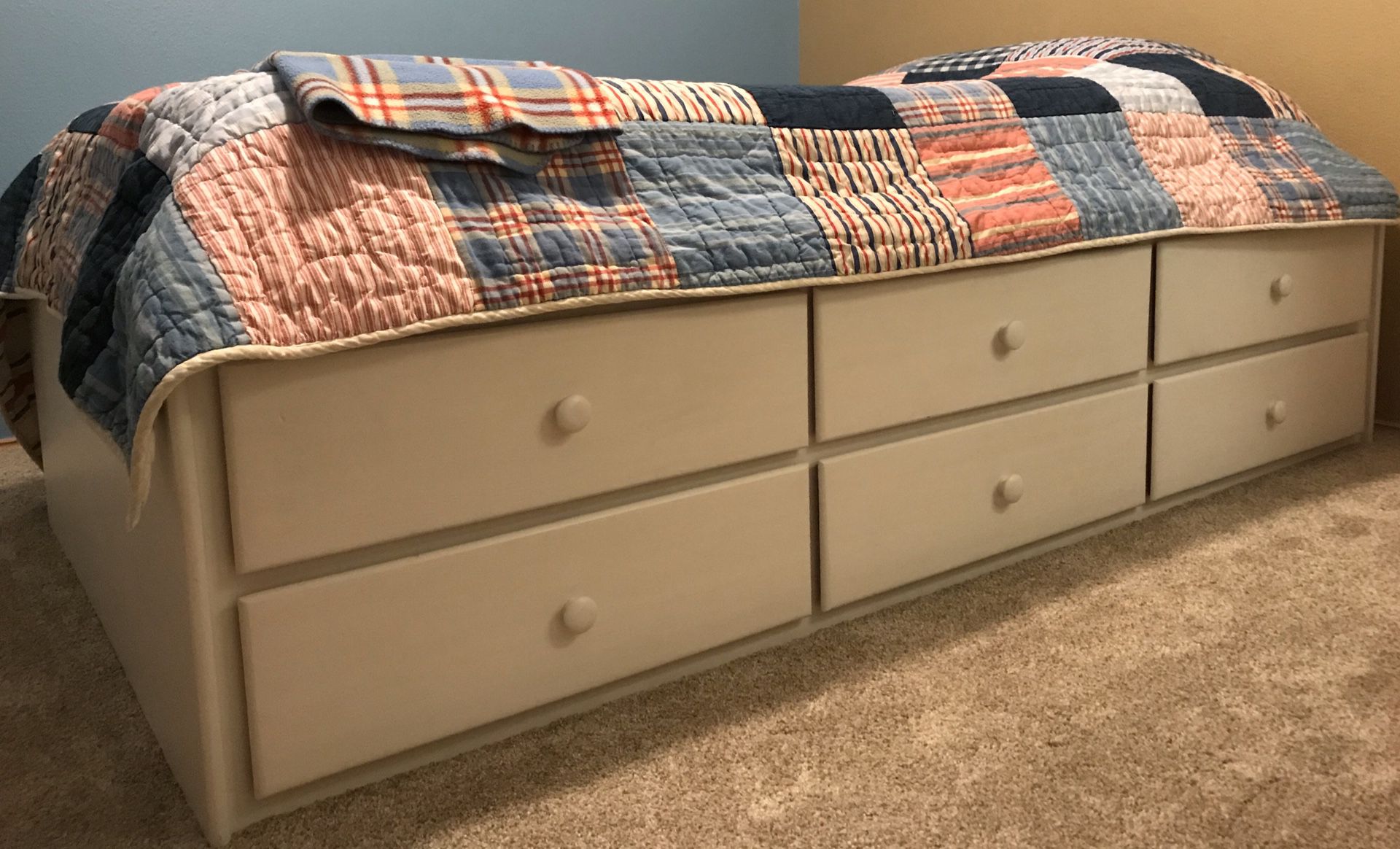 Twin bed with drawers