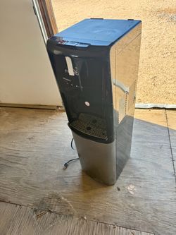 Primo water dispenser bottom loading