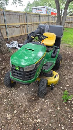 Today only, John Deere riding S100 with grass collector