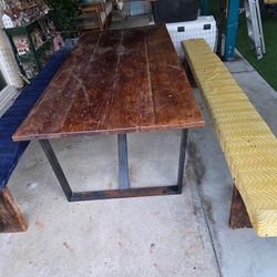 solid wood table with wooden bench seats