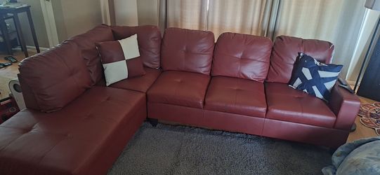 Wine / burgundy sectional couch
