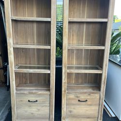 2 Wood Cases w/ Glass Shelves And Storage Drawer