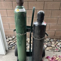 Oxygen Acetyene Bottles. With Cart 