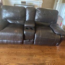 Brown leather recliner $100