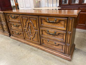 Wooden 9 Drawer Lowboy Triple Dresser with Carved Drawer Fronts and Brass Pulls