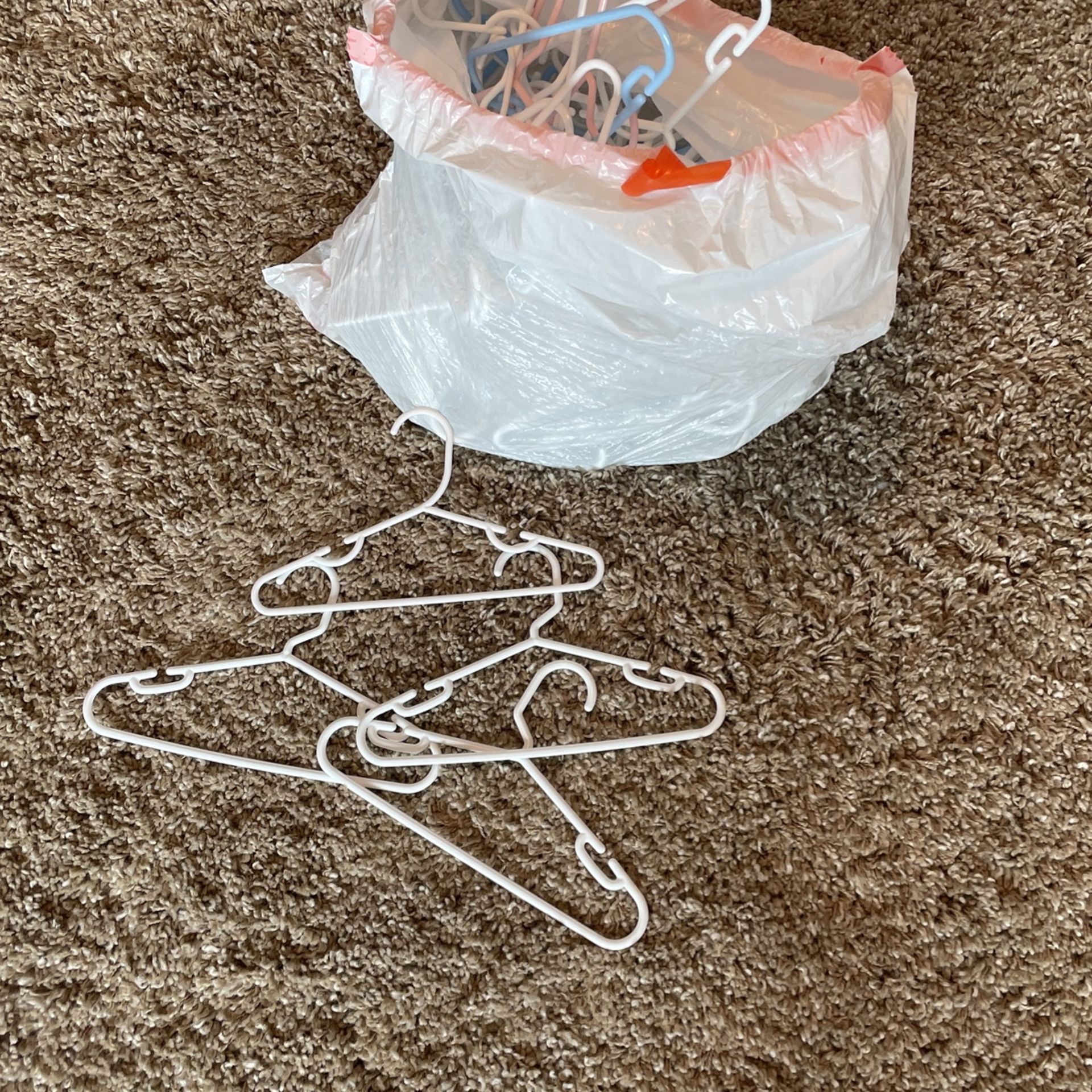 $1 Bag Of Small Plastic Hangers (for Small Kid Clothes)