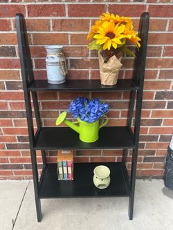 Three tier black decorative shelf