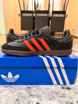 Black and orange adidas samba og