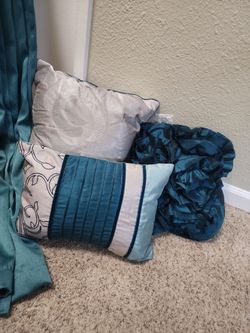 Teal Curtains and Decorative Pillows