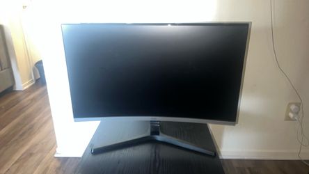 Samsung Essential S3 Series 27-inch Curved Monitor.