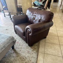 2 Couches, A Chair And An Elliptical Machine