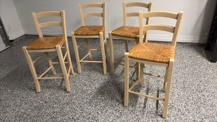 Four (4) Rattan  high back counter stools, with  solid wood frame