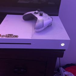 xbox one and controller with box