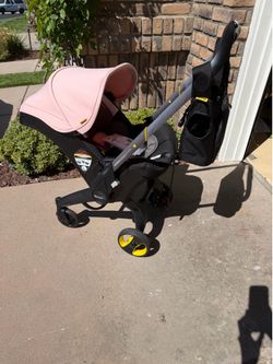 Doona stroller in pink