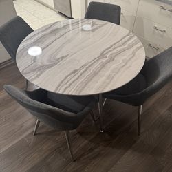 Table with 4 chairs included