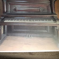 For Sell,As Is. Bush& Lane Upright Piano In Walnut Empire Revival Cabinet Made In 1904.Needs Restoring . Only Serious Inquiries 