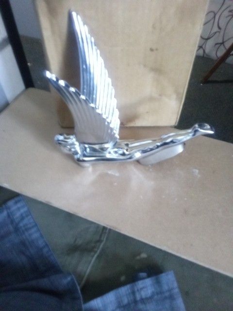 Flying Goddess" hood ornament,