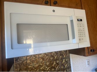 GE over the range microwave in white