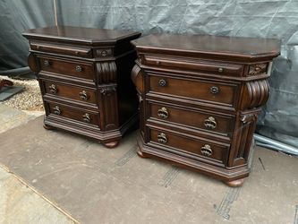 Two Dark Wood Ornate Nightstands
