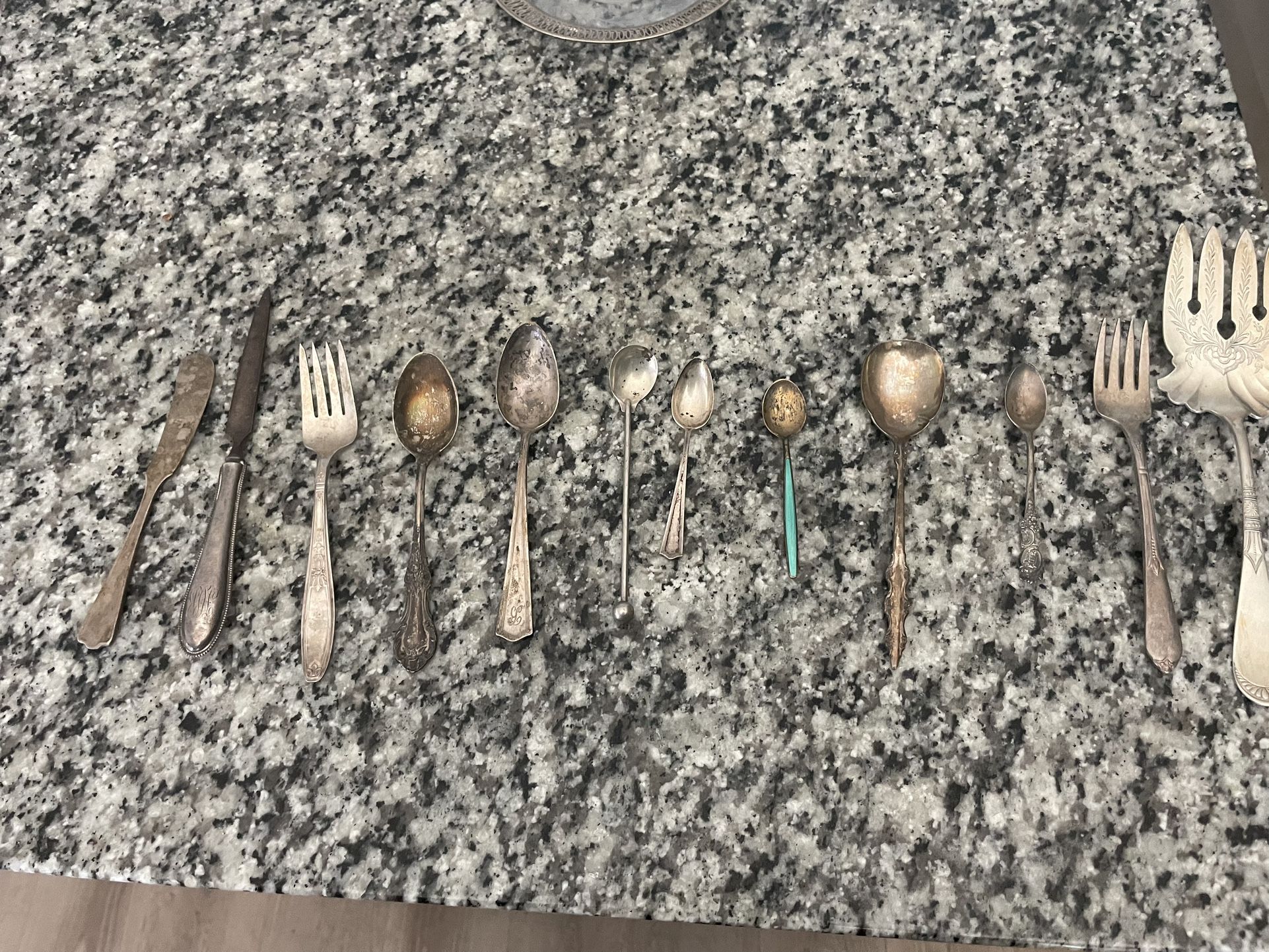 Varieties of antique spoons and forks