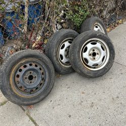 Toyota.  Corolla.  1999. OEM.  Rims. 4.   185 65 R 14