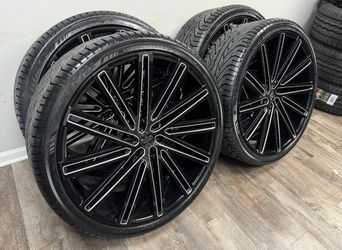 New 26 inch gloss black/milled wheels and lexani 305/30r26 tires