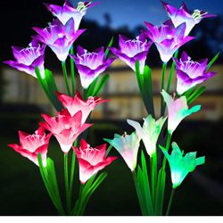 KOOPER Outdoor Solar Lights, 4 Pack Solar Garden Lights with Bigger Lily Flowers, Waterproof 7 Color Changing Solar Lights Outdoor - Bigger Solar Pane