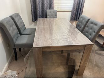 Dining table with chairs.