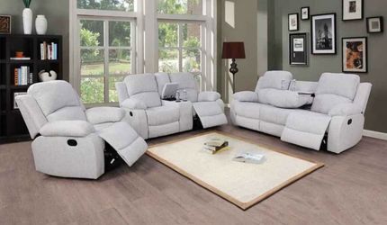 Gray fabric fully reclining three piece couch set