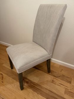 Two Restoration Hardware Upholstered Dining Chairs