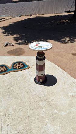Lighthouse plant stand