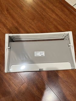 Brand new four-tier shoe rack, holds 12 pairs of shoes.