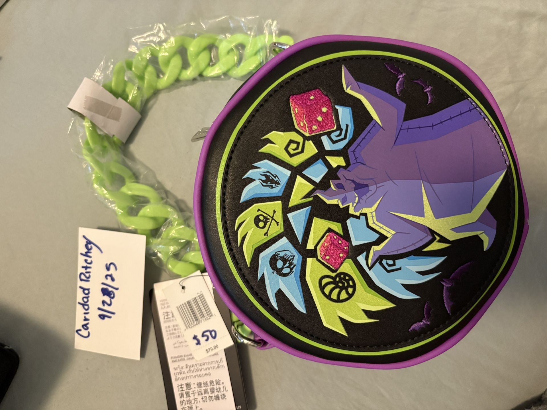 Loungefly Disney The Nightmare Before Christmas Oogie Boogie Glow Crossbody Bag.