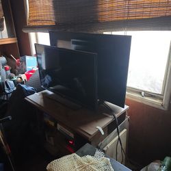 2 Flat Screens 1 Sony 1 Rca 