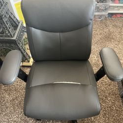 Gray rolling desk chair