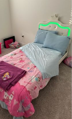 Twin bed - headboard and footboard, frame and mattress included