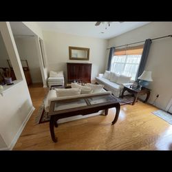 Wood and glass matching coffee table, sofa table and side table.