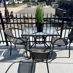 4 Piece of Glass table/ With 3 mesh chairs (2 Available) 