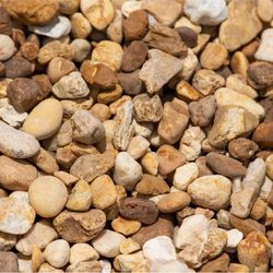BULK ROCK - BROWN RIVER ROCK 1" - 1½" ($200 per ton + Delivery)