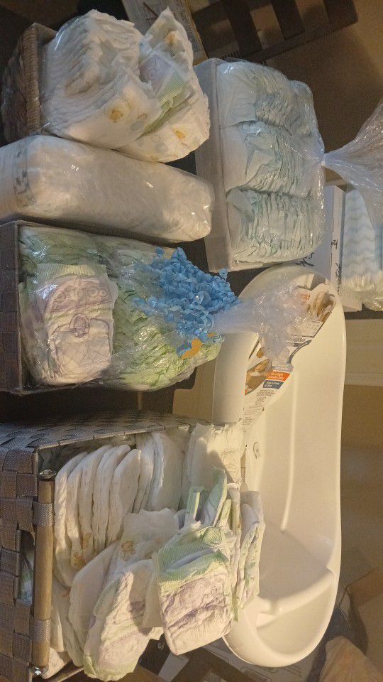 100+ Newborn And Size 1 Diapers And Brand New Baby Bath Tub 
