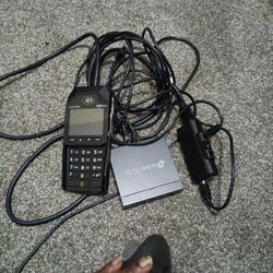 Ingenico Lane/3000 PIN pad and a TP-Link gigabit switch.