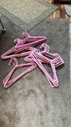 Plastic hangers, pink