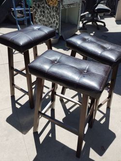 $45 obo  3 saddle faux leather bar stools