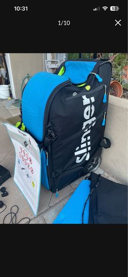 Slinger tennis machine with extra battery