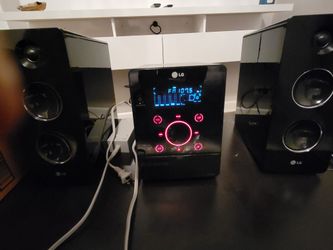 LG ENTERTAINMENT SYSTEM W/DVD, CD PLAYER - $100.00 Obo