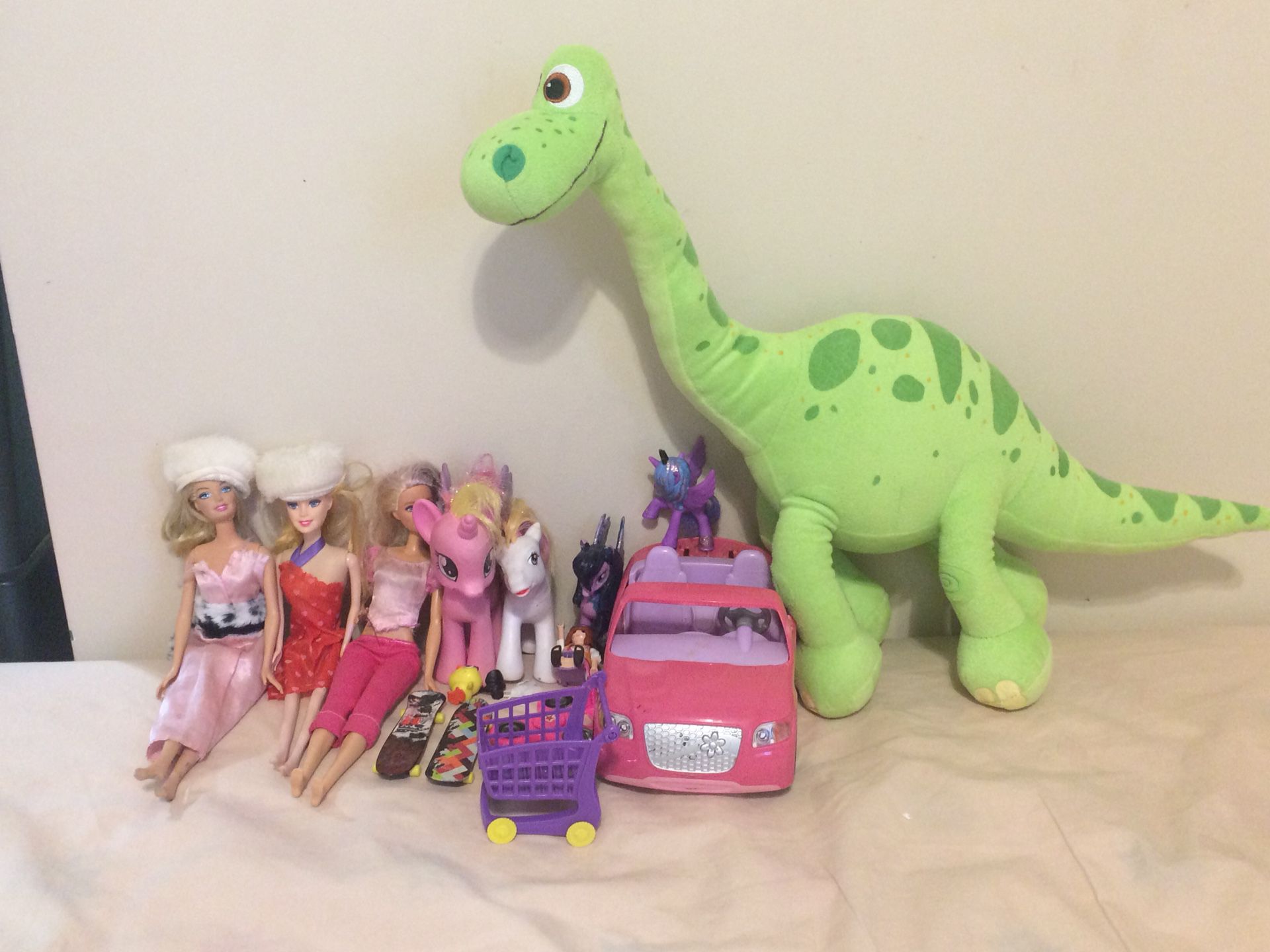 Dolls and barbie car with other toys