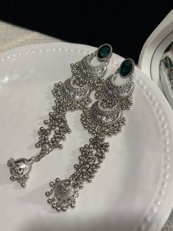 Silver Chandelier Jhumka Earrings with Green Stone